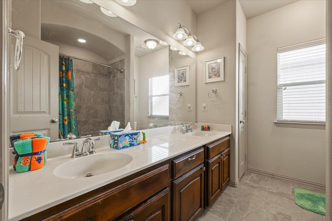 Secondary full bath upstairs | Image 25