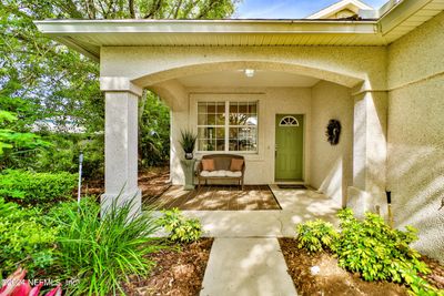 Relax out on the shady front porch and enjoy greeting your neighbors. | Image 3