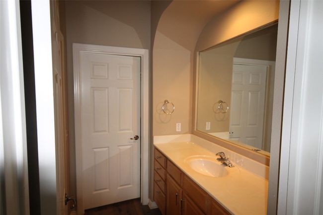 Bathroom featuring vanity and wood finished floors | Image 13