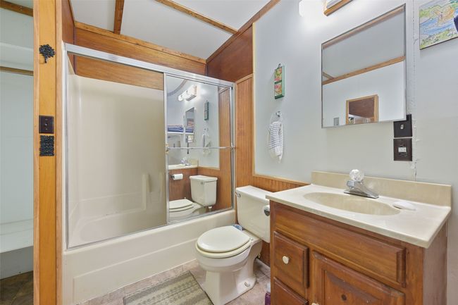 Apartment Full bath featuring shower / washtub combination, toilet, and vanity | Image 30