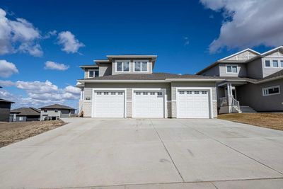 10608 150 Ave, House detached with 3 bedrooms, 2 bathrooms and 6 parking in Grande Prairie AB | Image 1