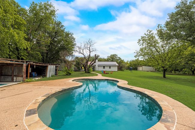 Outdoor pool with a lawn and an outbuilding | Image 7