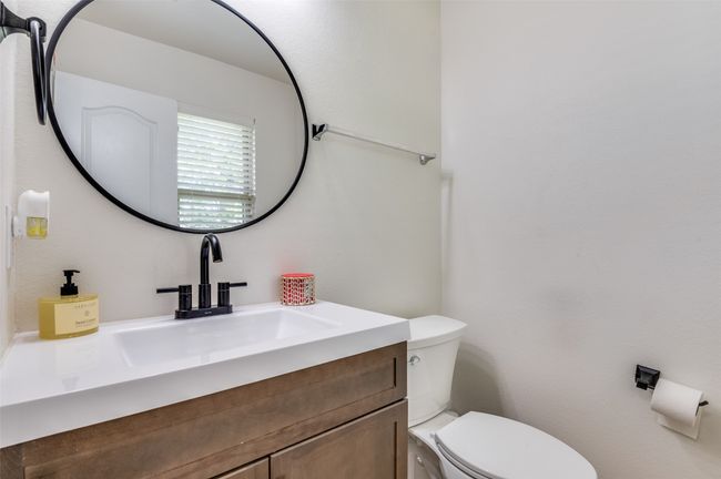 Half bathroom on the 1st level of he home. | Image 14