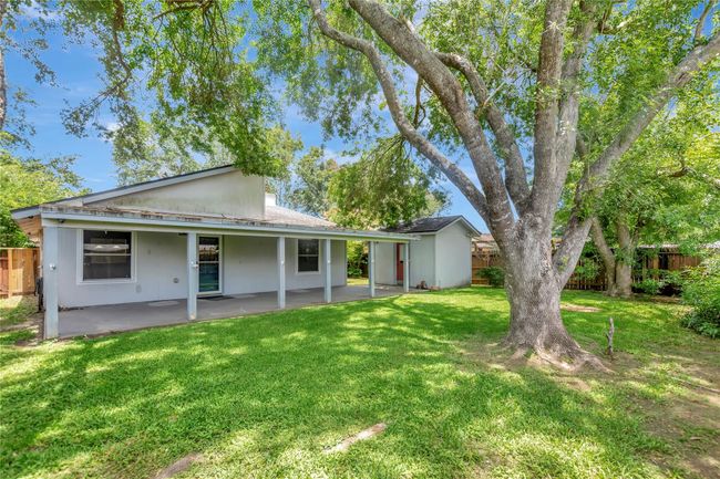 Another view of backyard with shed | Image 18