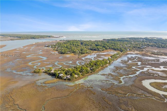 Hightide water view in front of home beyond the berm. | Image 61