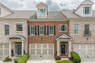 6142 Narcissa Place, Townhouse with 3 bedrooms, 3 bathrooms and null parking in Johns Creek GA | Image 1