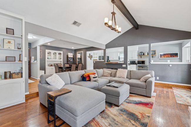 Open concept living is the best! Watch the game from the kitchen, or breakfast room, or dining room, as well as the living room. Nice built-in's for your collectables! | Image 6