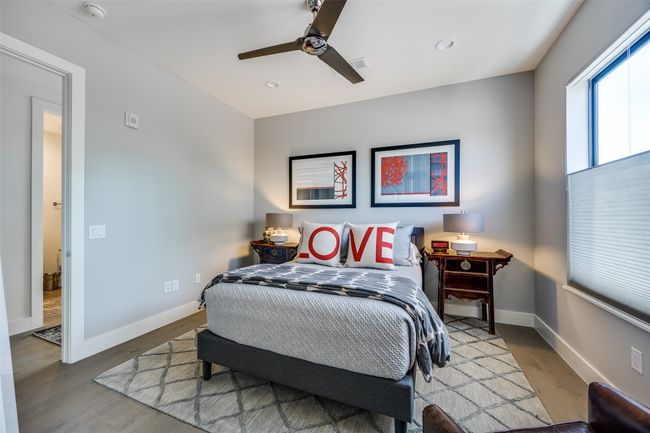 Bedroom featuring ceiling fan, baseboards, wood finished floors, and recessed lighting | Image 26