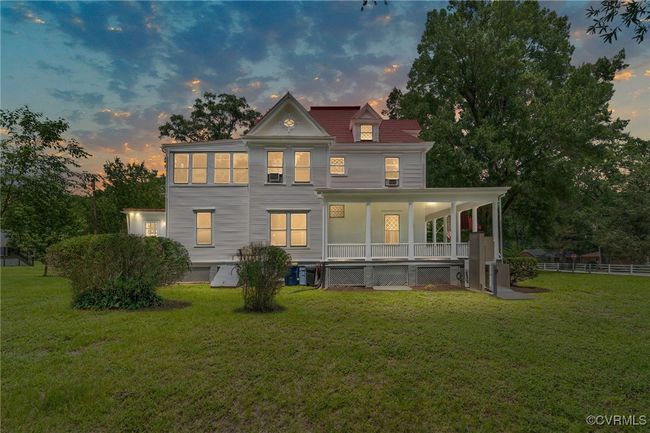 Rear view of house with a porch | Image 50