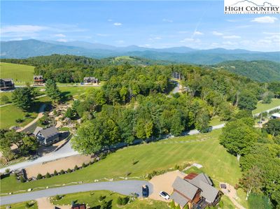 .427 Acre Cleared Lot directly across from the Eagles Nest Winery which is across the street Grey in Color Building | Image 1