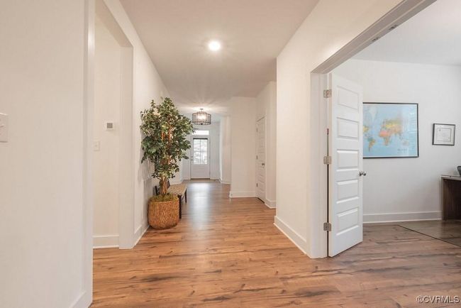 Hall with light wood-style flooring | Image 7