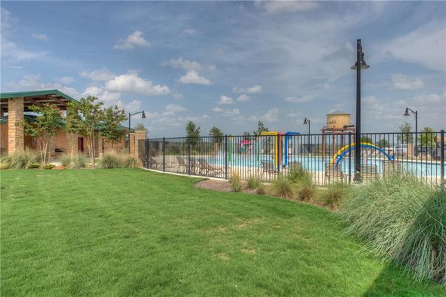 View of yard with a community pool | Image 12