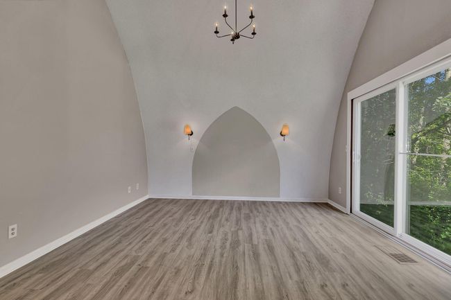 Grand cathedral ceiling making the primary feel like a true retreat | Image 16