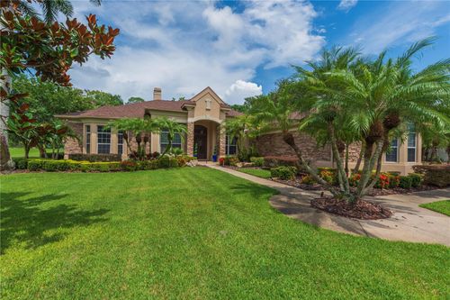 911 Pine Lake Dr, TARPON SPRINGS, FL, 34688-7360 | Card Image