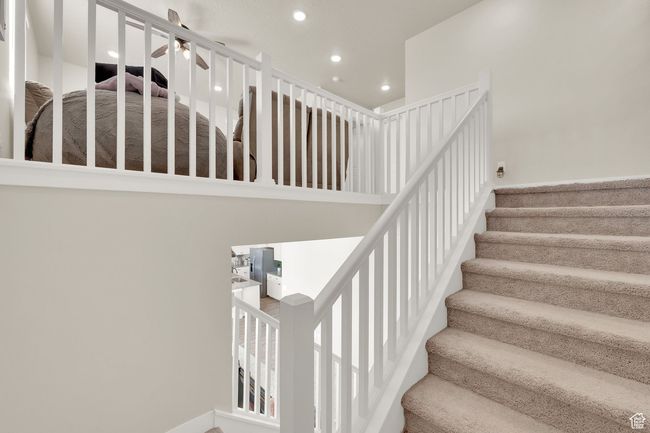 Staircase with recessed lighting and a ceiling fan | Image 18
