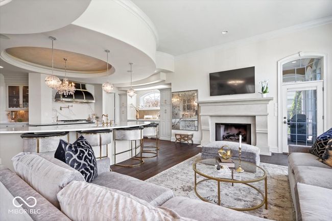 The hearth room is the perfect place to relax before or after meals. | Image 23