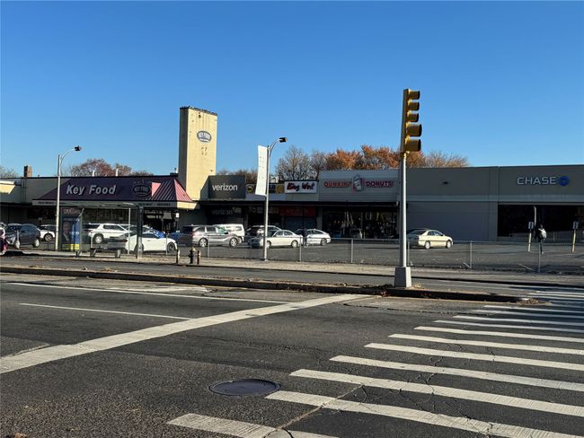 View of building exterior with uncovered parking | Image 13