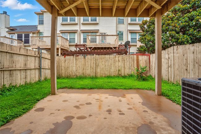 Fenced backyard featuring a patio area | Image 32