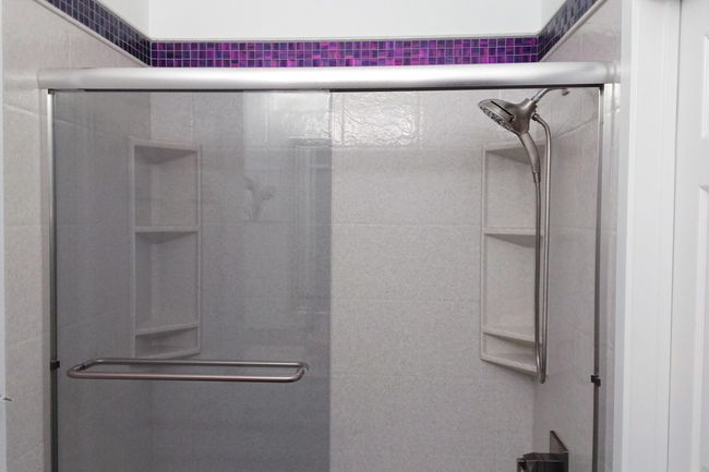 Bathroom featuring a stall shower | Image 25