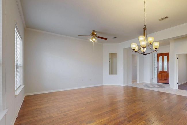 bright and airy great room, formal dining/ living room combination or just an extensive living room | Image 6