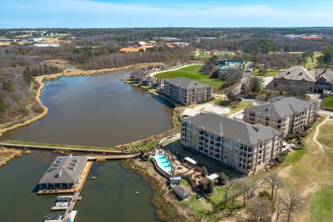 View of property location featuring a nearby body of water and apartment complex / building | Image 30
