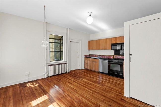 Kitchen has eating area | Image 9