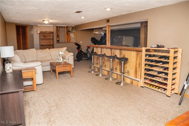 View of carpeted rec area | Image 40