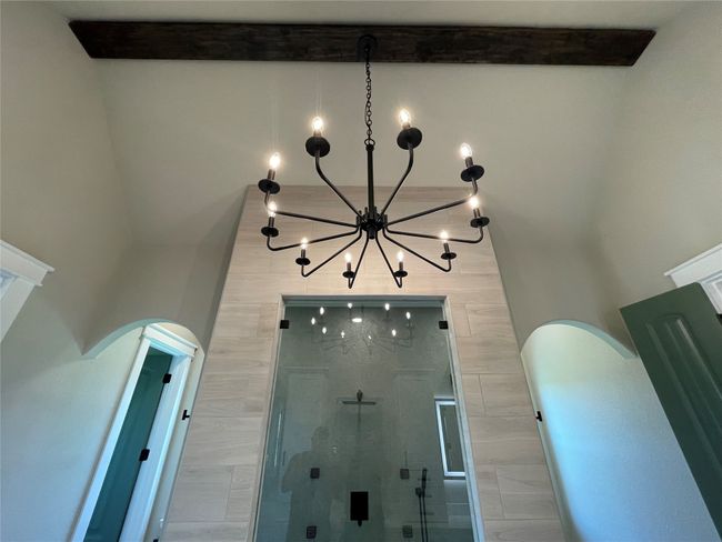 Detailed view of arched walkways and a chandelier | Image 21