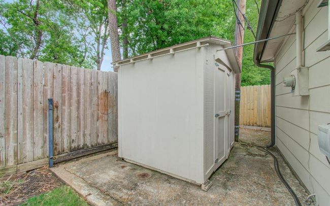 More storage with a freestanding storage building behind the garage PLUS a 19x3 storage building added to side of garage (not shown in pictures) | Image 42