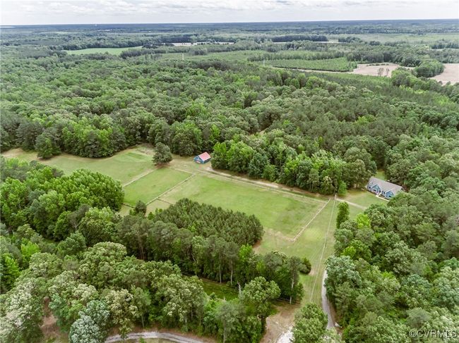 Drone / aerial view of a heavily wooded area | Image 6