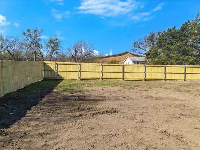 View of yard featuring a fenced backyard | Image 31