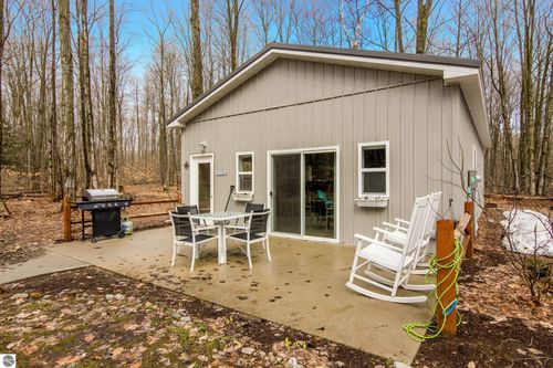 8660 Wilderness Trl, Traverse City, MI, 49684-9399 | Card Image