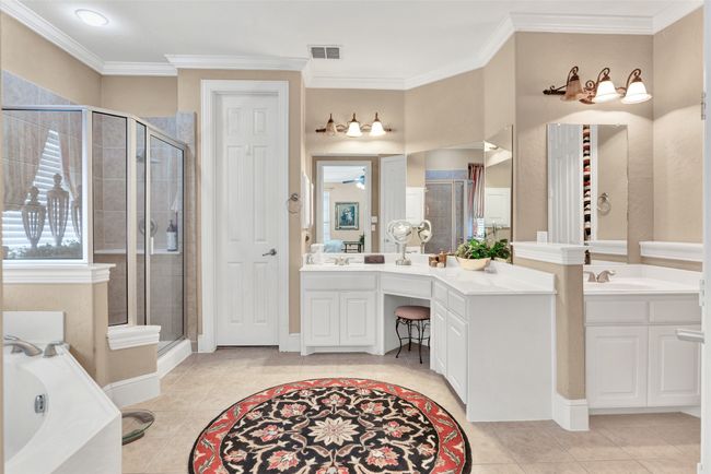 You'll be enchanted by the primary bath! dual vanities, oversized shower and two custom walk-in closets! | Image 15