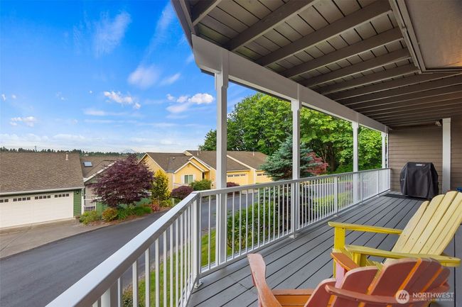 Step out of the primary bedroom to this great deck. What a beautiful spot to watch the world go by! | Image 24
