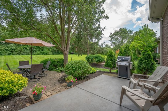 view of patio with area for grilling and outdoor dining space | Image 29