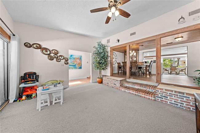 Main Home - Extend your Family Room or have an open area for little ones to play. | Image 38