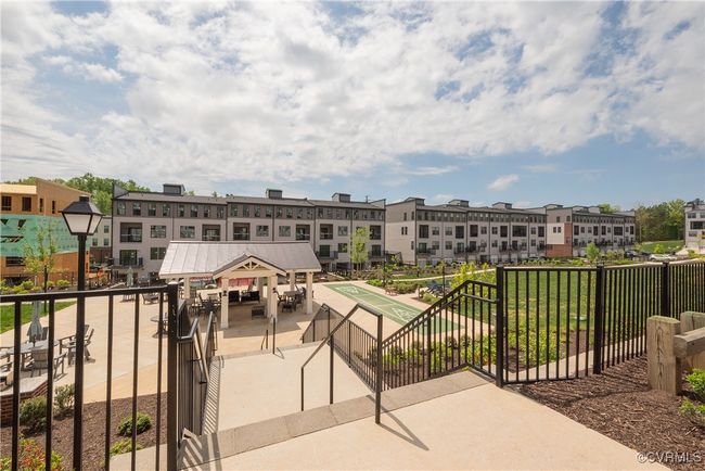 View of property's community with fence, a gazebo, and shuffleboard | Image 48