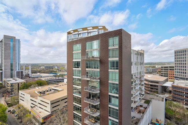 View of building exterior with a view of city | Image 28
