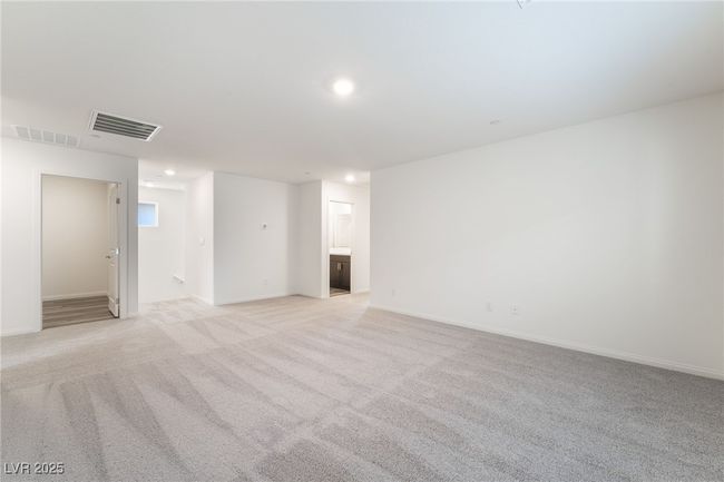 Empty room with recessed lighting and light carpet | Image 16