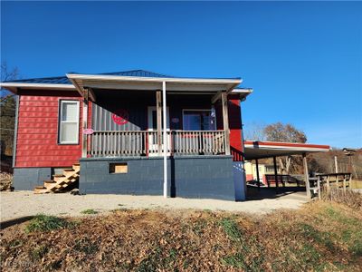 View of front of house with covered porch | Image 2