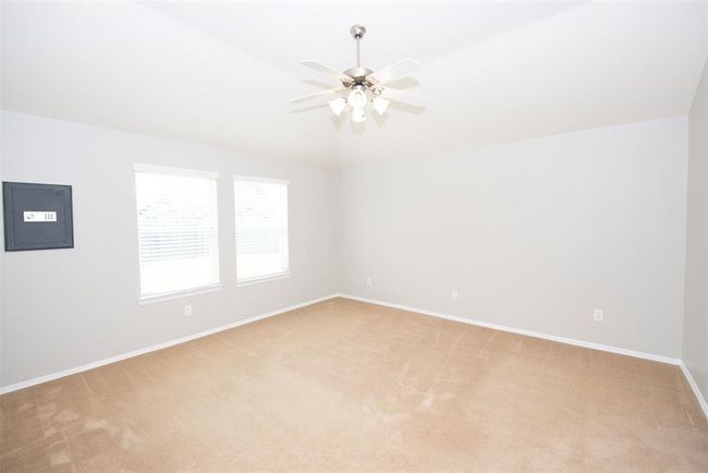 Incredible primary bedroom facing the back of the home with vaulted ceiling. | Image 16