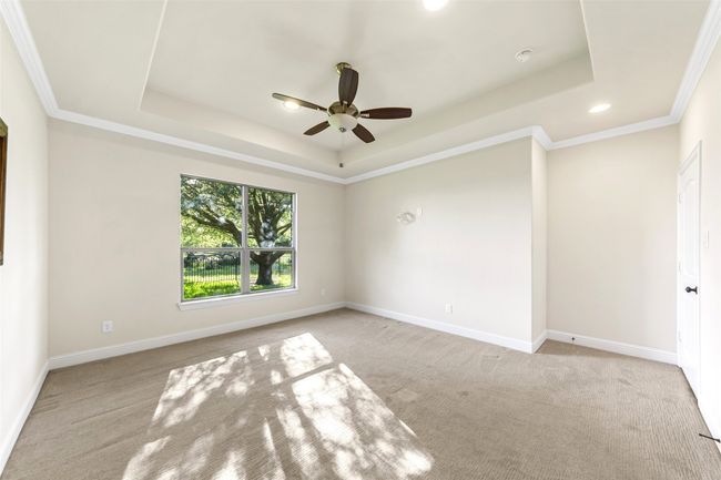 Master retreat in back of home for seclusive privacy and view of backyard and large oak tree! | Image 21