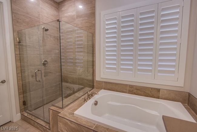 Bathroom with a bath and a shower stall | Image 11