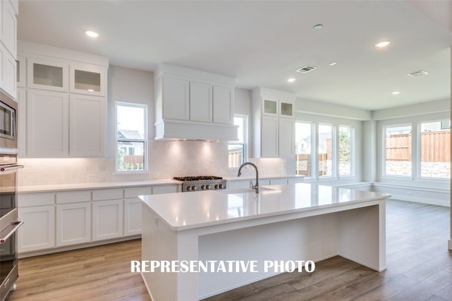 Featuring tons of storage and fantastic finishes, the kitchen of your dreams awaits! REPRESENTATIVE PHOTO. | Image 7