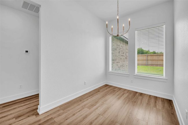 Please Note: These interior photos are not of the actual design, but are of a completed design with a similar floor plan. Finishes, features, and layouts may vary. | Image 8