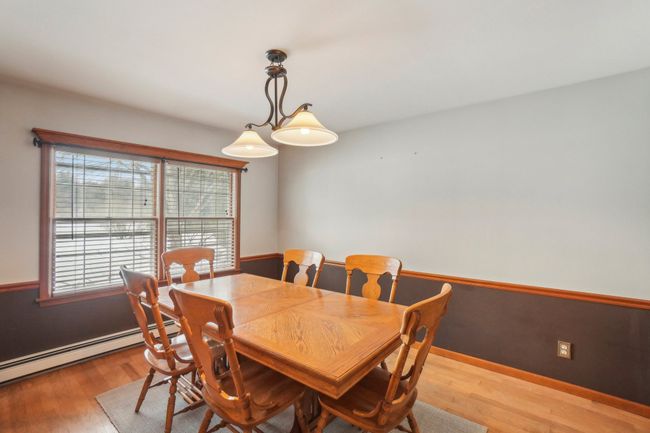 Eating area faces west and overlooks rear yard. | Image 8