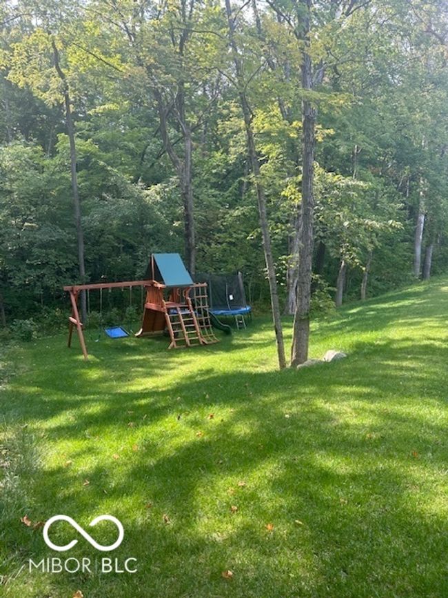 Here is a view of the yard last summer. It offers complete privacy and beautiful views. | Image 72