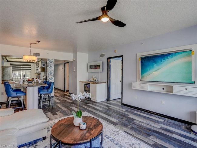 VIEW FROM LIVING AREA SHOWING ENTRANCE TO OWNER'S SUITE | Image 6