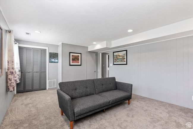 Living area with carpet and recessed lighting | Image 24