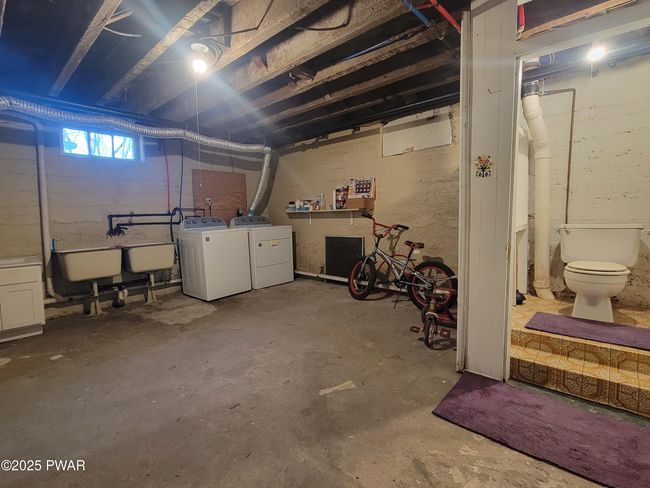 Lauundry and Half bath in basement | Image 36
